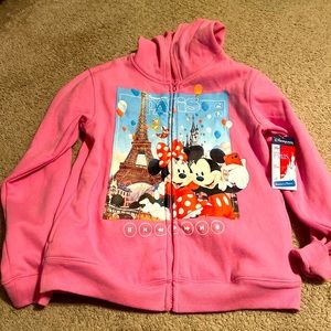 NWT Disneyland  Paris Long Sleeve zip up With Hood  Size 12. 2 Pockets.